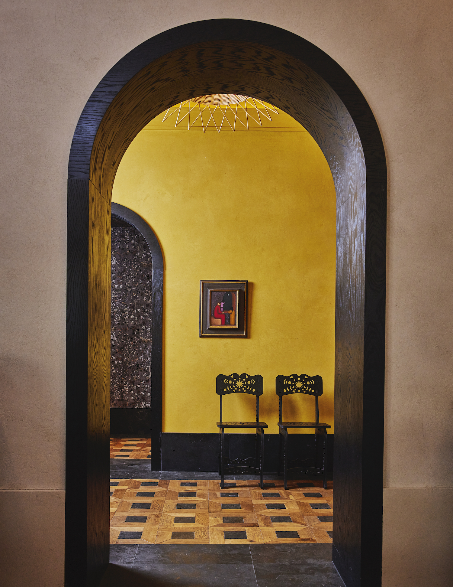 Hotel hallway designed by Kelly Wearstler with Spanish influences