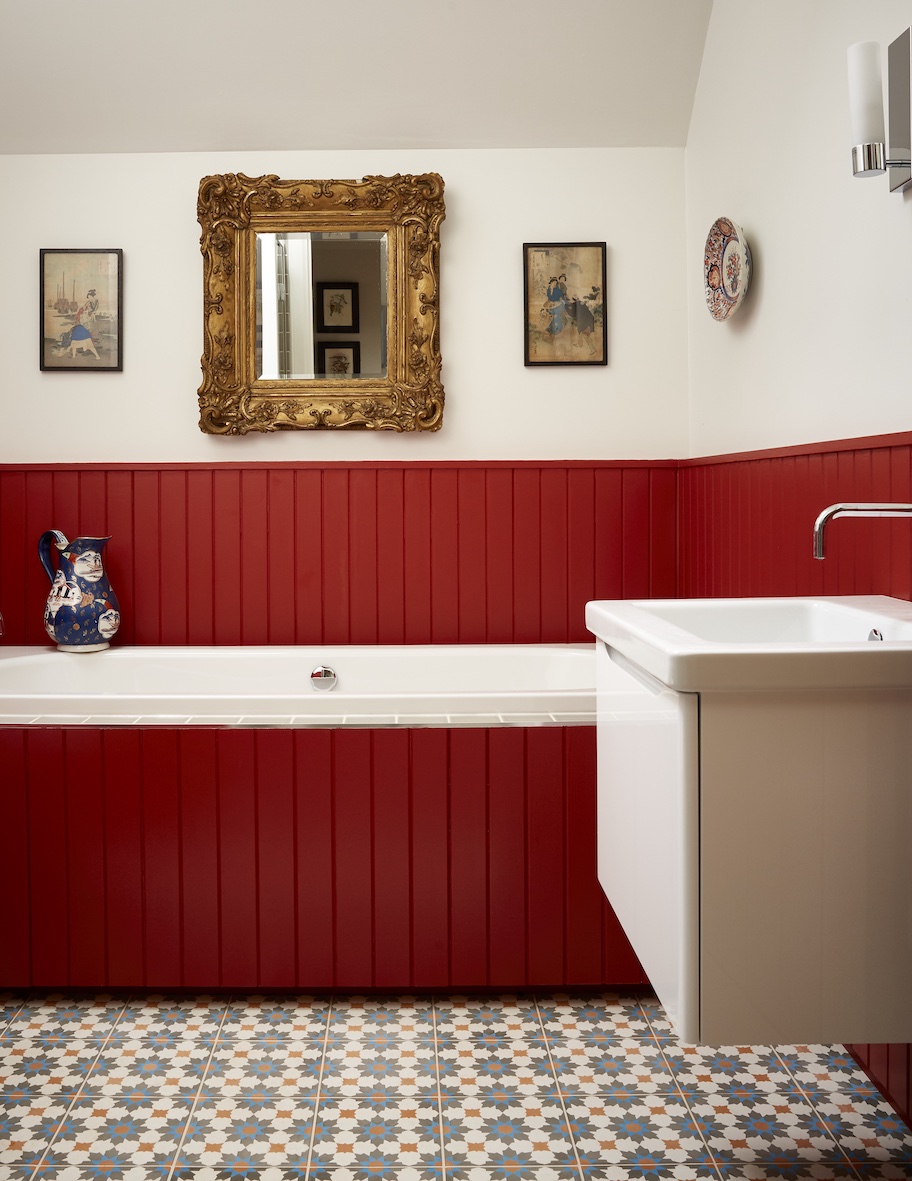 Red bathroom accents by Kelling Designs