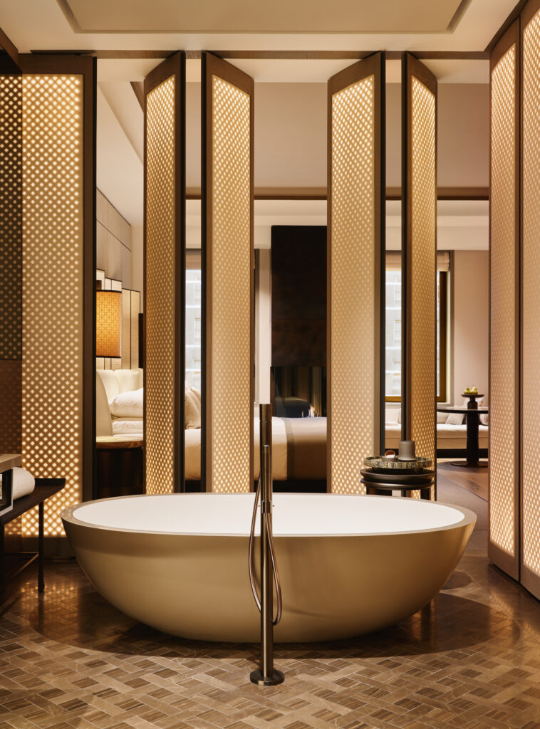 Junior suite bathroom with louvred doors at Aman New York in Effect Magazine