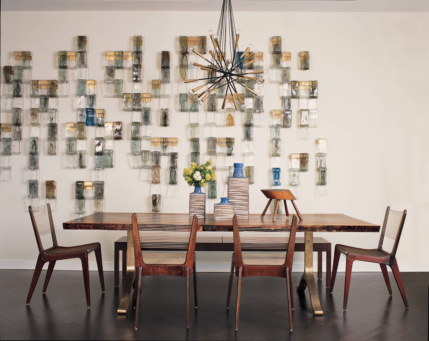 Brutalist wall hanging in a dining room interior designed by Amy Lau on Central Park West in New York