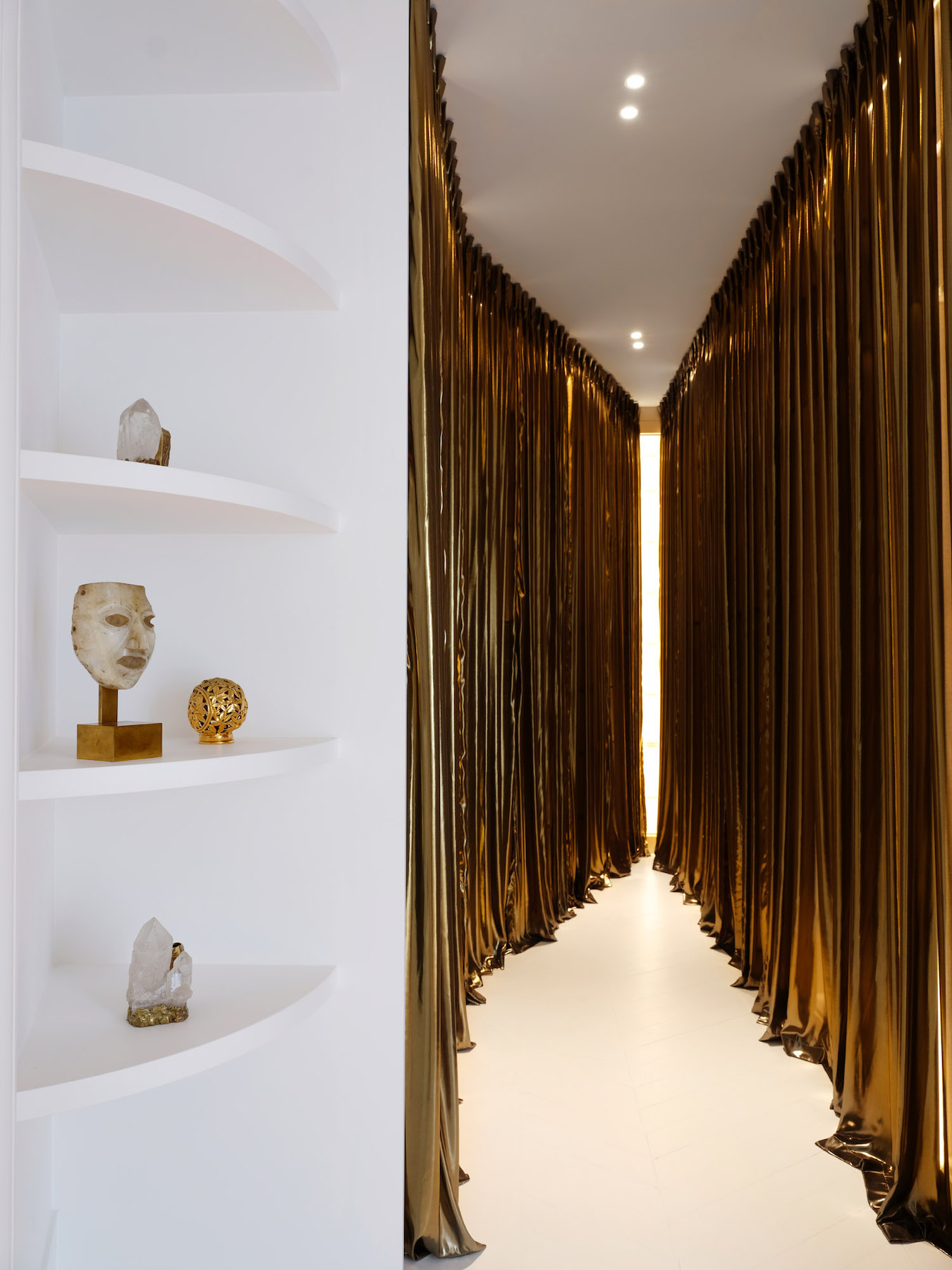 Gold drapes at interior designer Tala Fustok's Avenue Foch project in Effect Magazine
