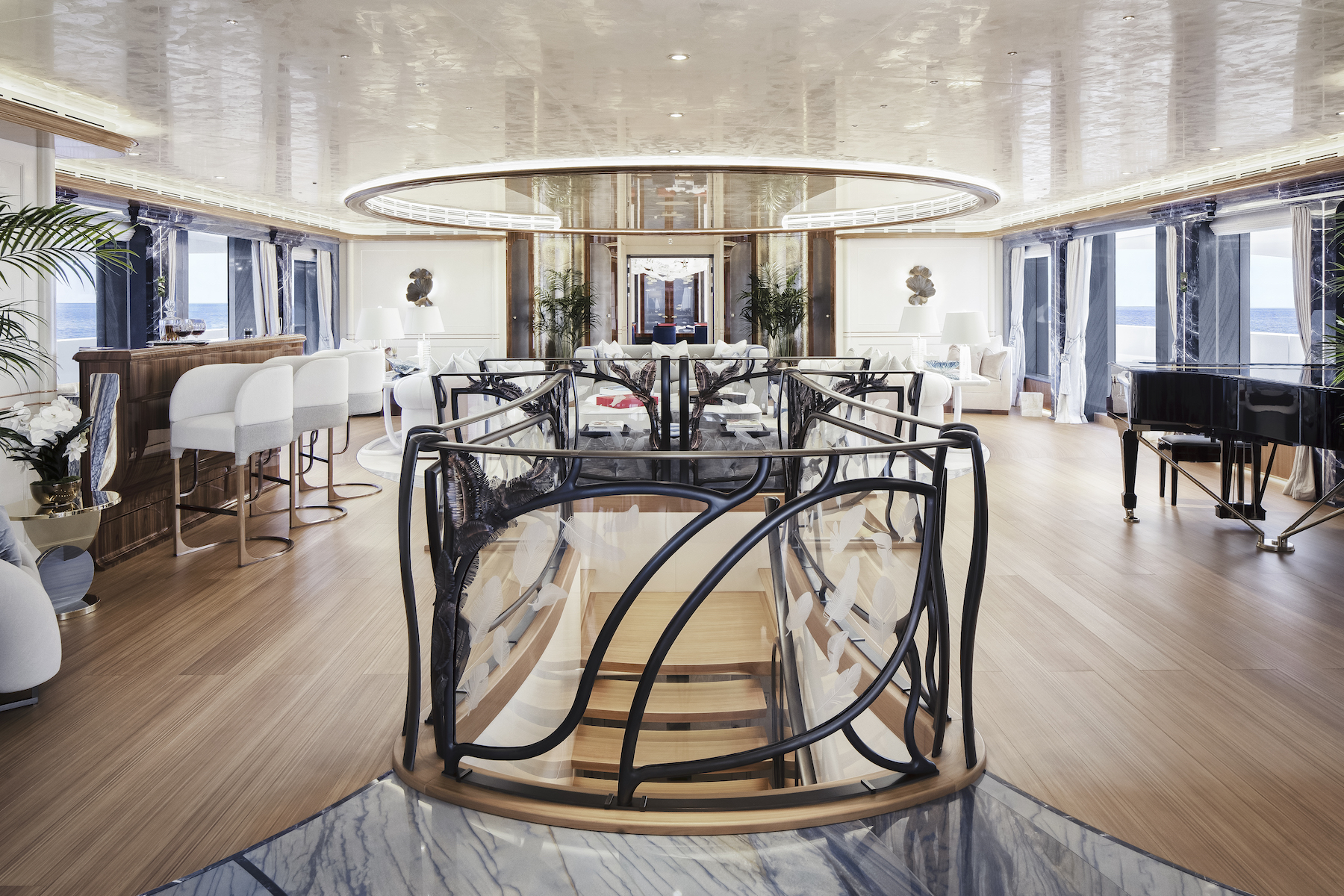 Grand staircase on Ahpo superyacht at Miami International Boat Show 2023 in Effect Magazine