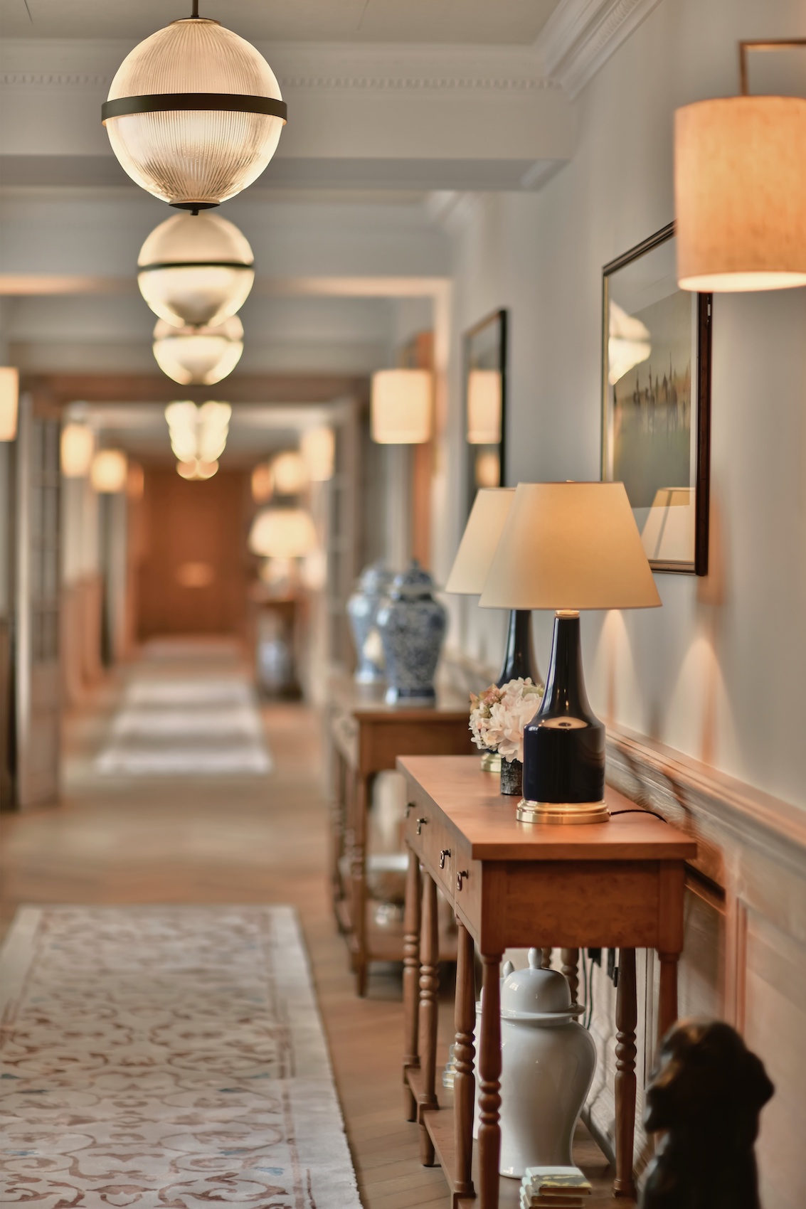 Processional hallway at The Astor at 9 Millbank with interior design by Goddard Littlefair