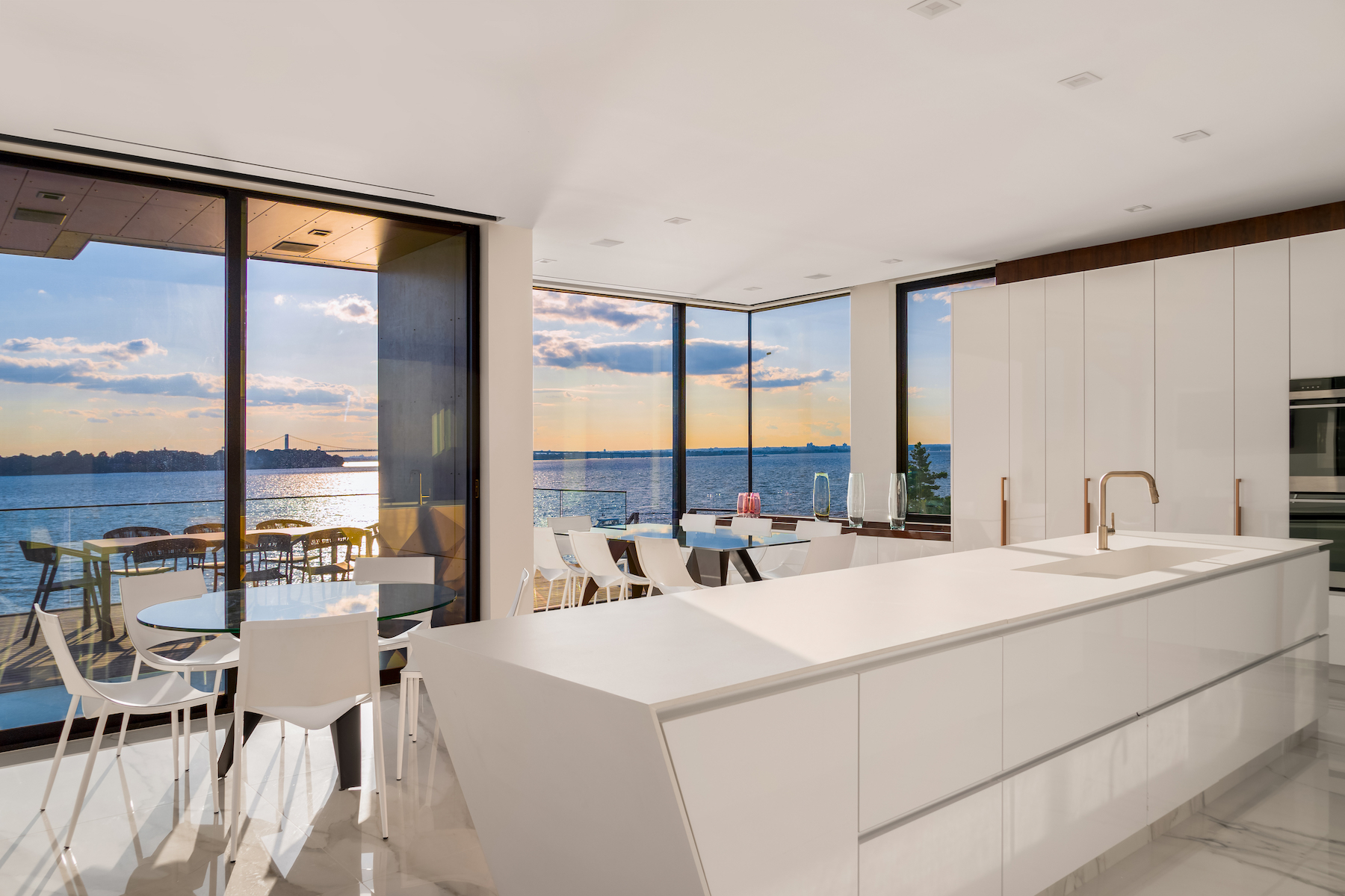 The villa's designers echoed the stunning views of Manhattan Island across the bay with geometric shapes and bold lines - Effect Magazine