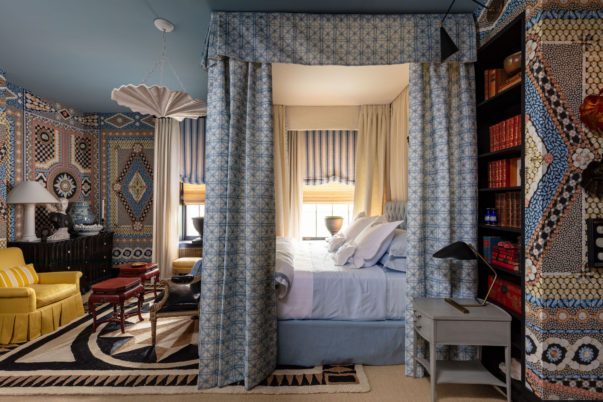 Interior designer Mary McDonald created a layered bedroom with wallpaper and drapery from Schumacher and floor coverings by Patterson Flynn at 2023's Kips Bay Decorator Show House New York in Effect Magazine