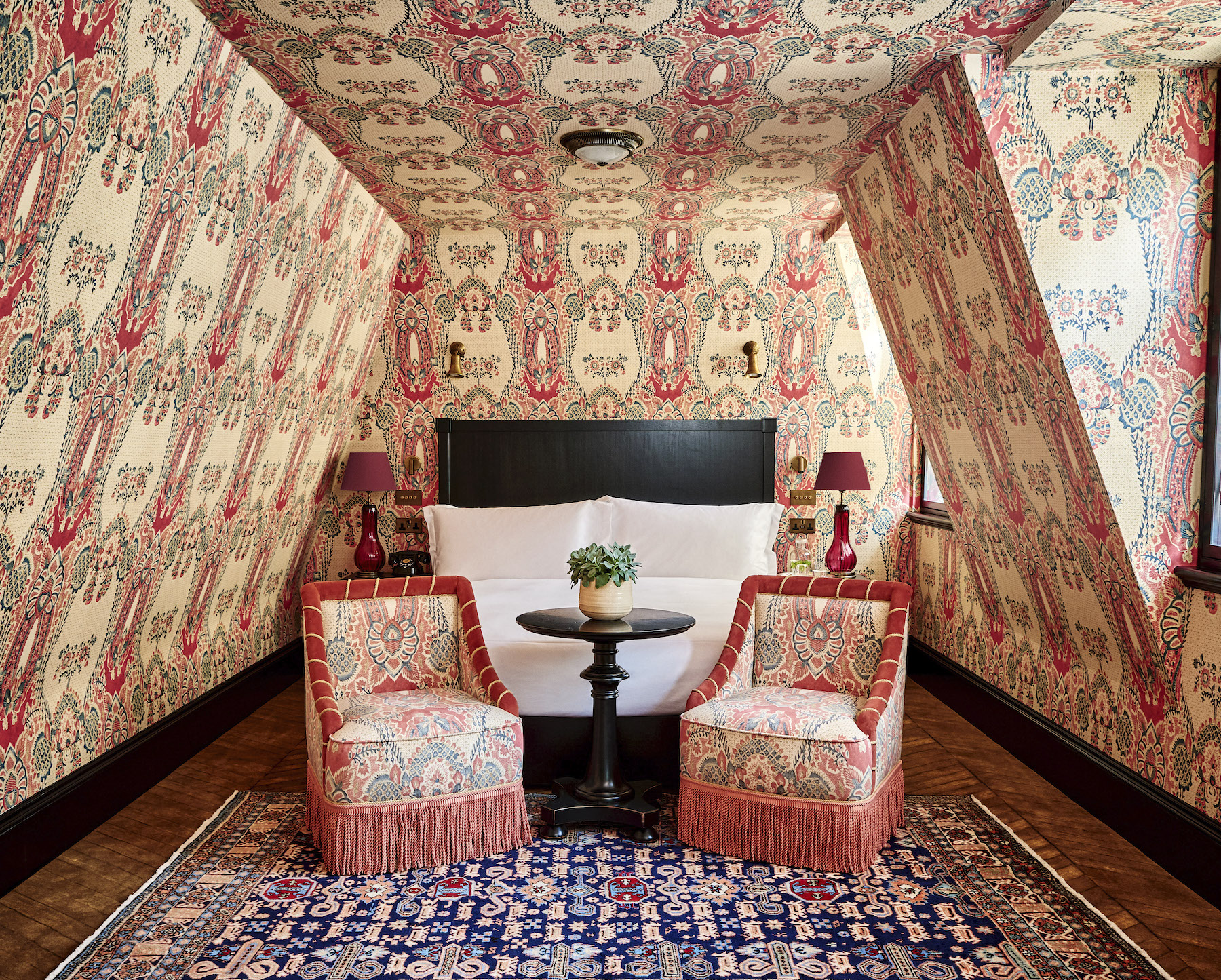 A bedroom at London hotel The Twenty Two by interior designer Natalia Miyar in Effect Magazine