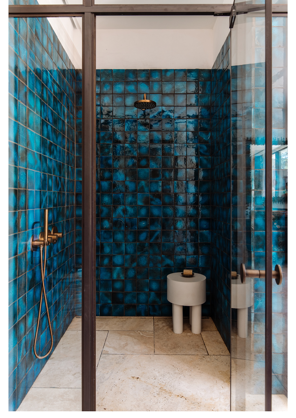 Blue Italian tiled bathroom by interior designer Natalia Miyar in Effect Magazine