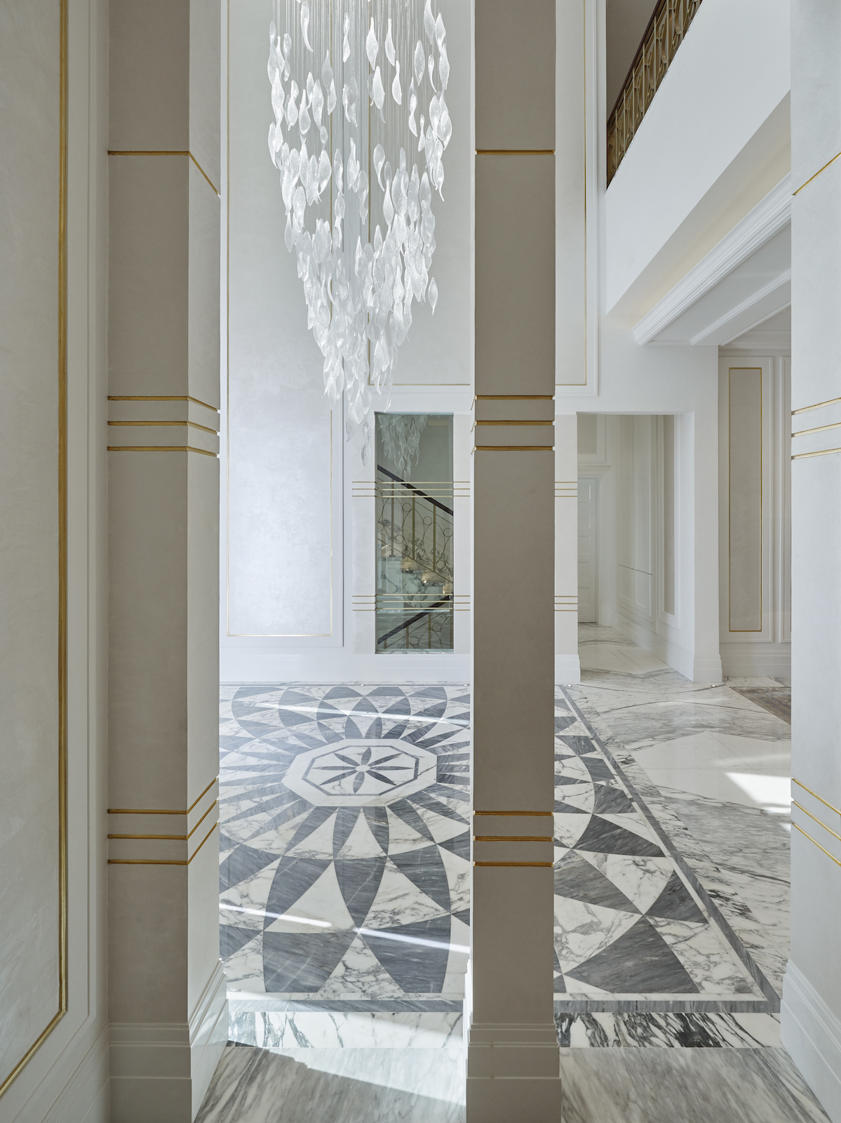Hallway of a villa by interior designer Katharine Pooley on Doha's Pearl Island - Effect Magazine