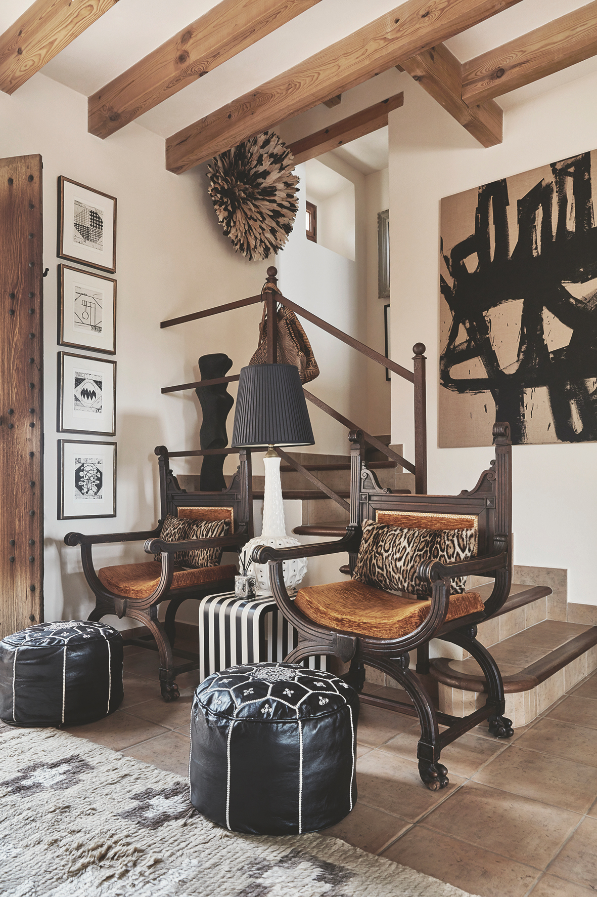 Hall in the Mallorca home of Marlene Birger, with abstract artwork by herself - Effect Magazine