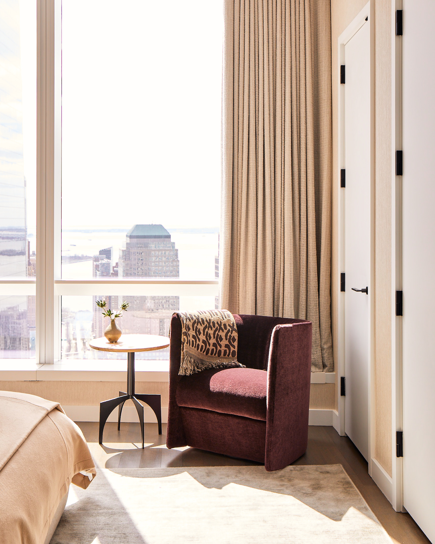 Bedroom view in a Tribeca penthouse in New York interior designed by Jessica Gersten in Effect Magazine