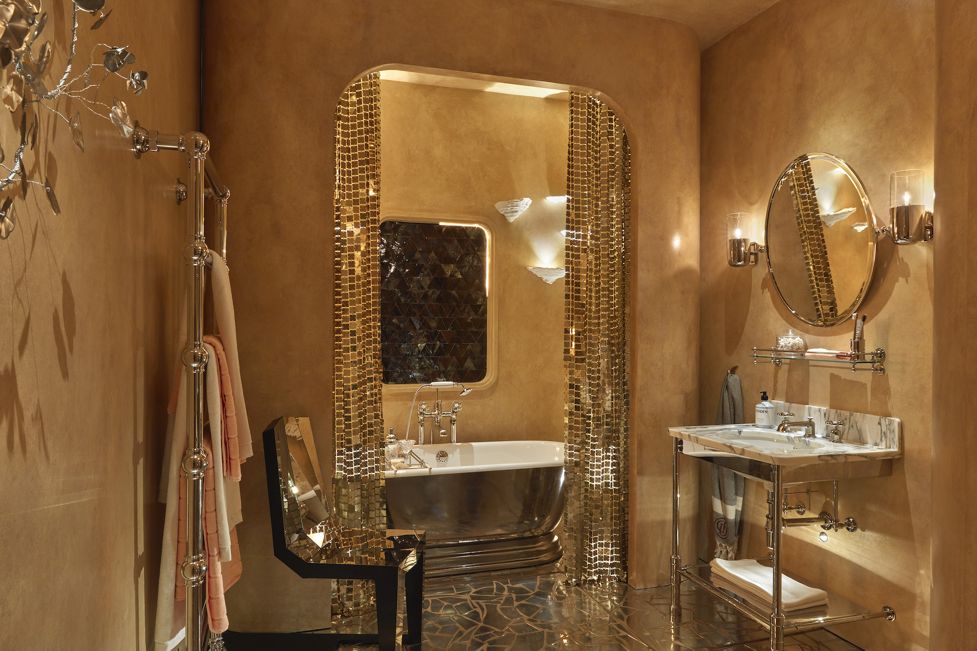 Lucy Barlow and Joshua Sear created a bathroom suffused with 1970s space-age glamour, including a Paco Rabanne “space curtain”- Effect Magazine