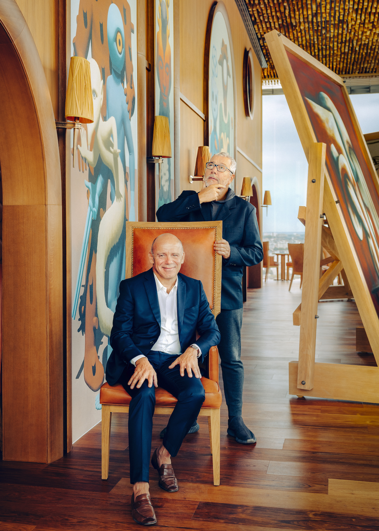 TOO Hotel owner Laurent Taïeb (seated) and its designer, Philippe Starck - Effect Magazine