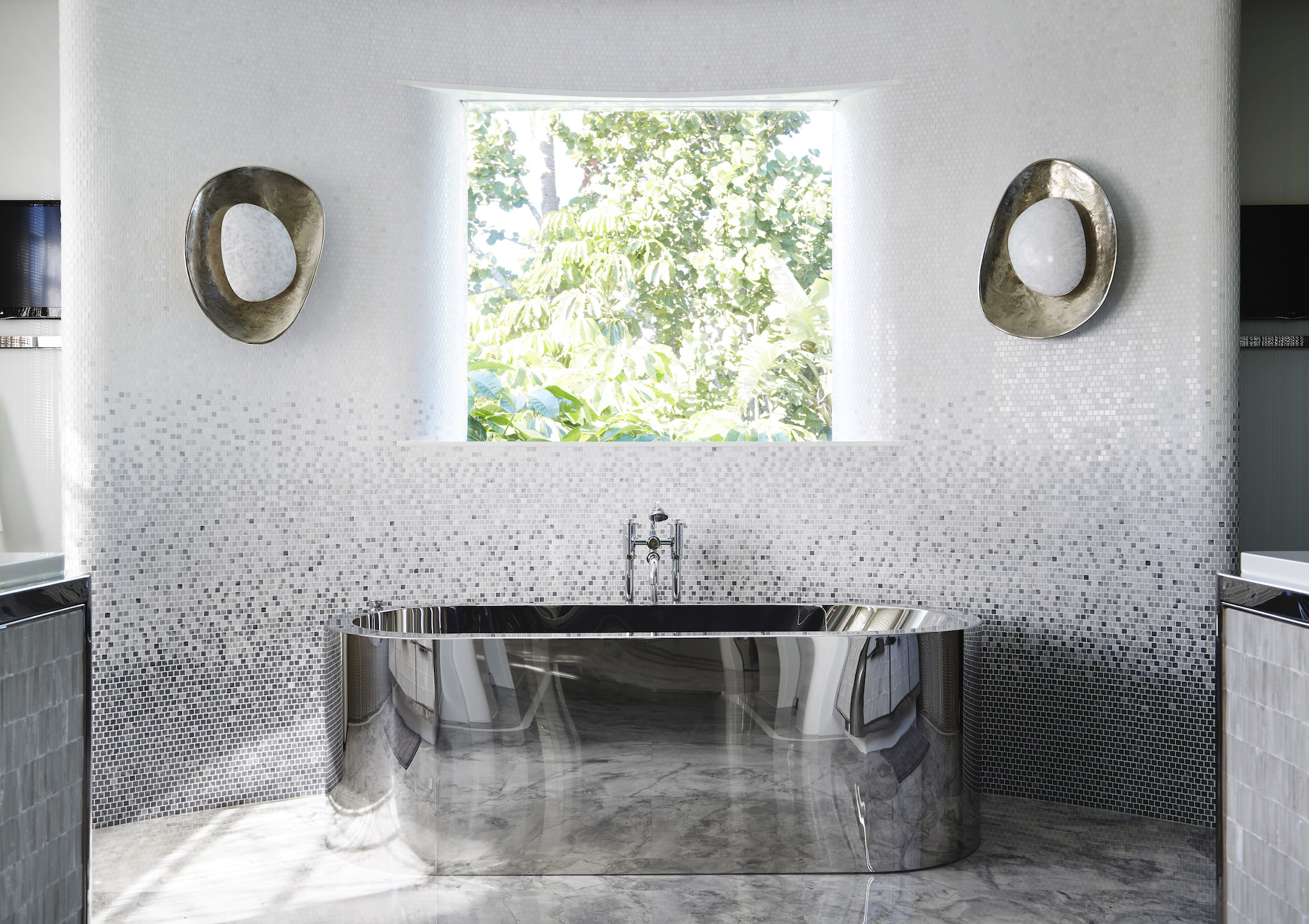 Palm Beach project by Pembrooke & Ives utilises sleek, glamorous polished steel, sculptural sconces and a rain-invoking mosaic - Effect Magazine