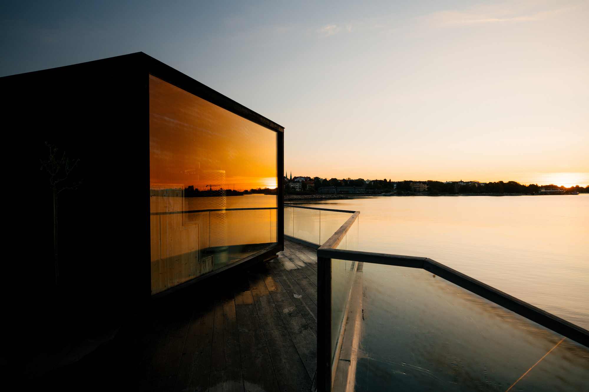 Löyly sauna, designed by Finnish architectural firm Avanto, with a striking glass front - Effect Magazine